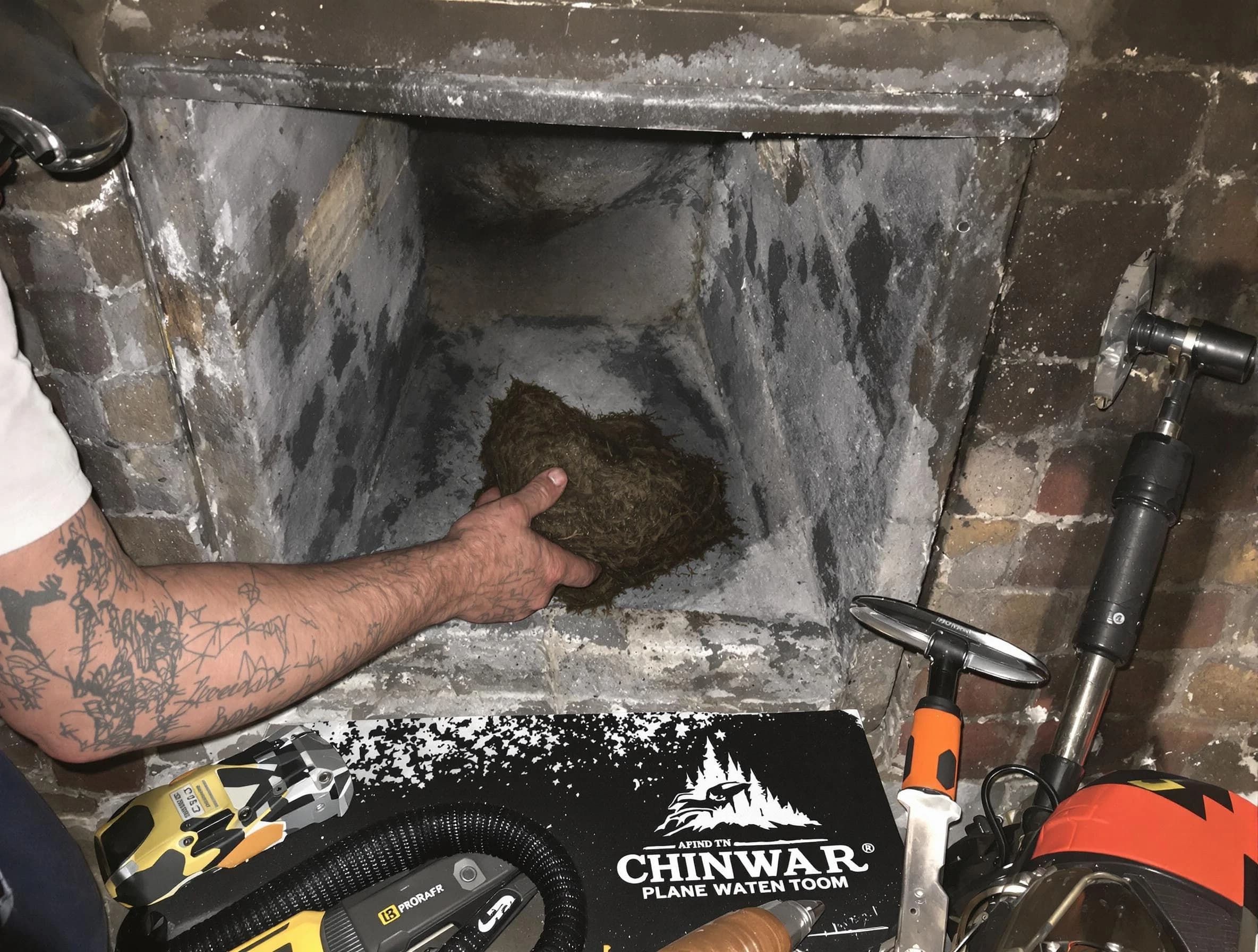 Short Pump Chimney Sweep safely removing debris and screening chimney in Short Pump, VA